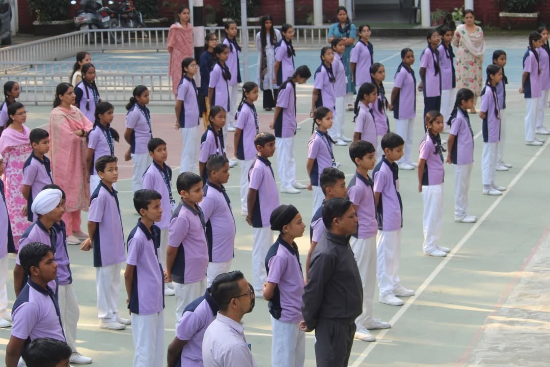 Students working together during a house activity